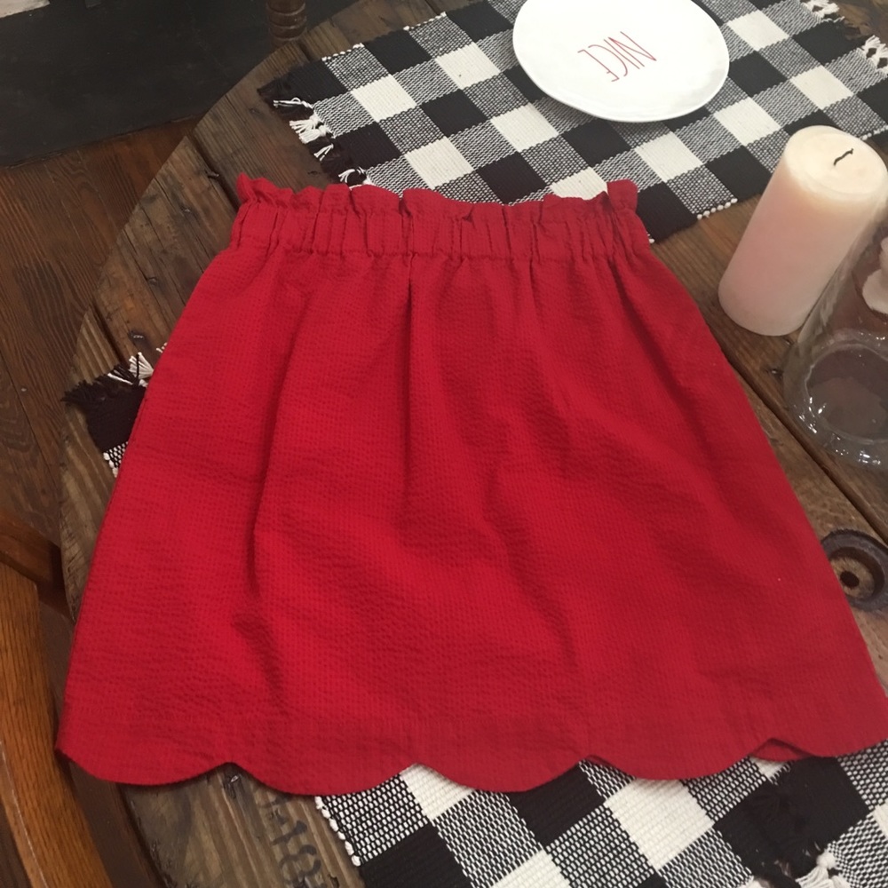 Lauren James red skirt